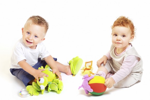 Babies play with toys